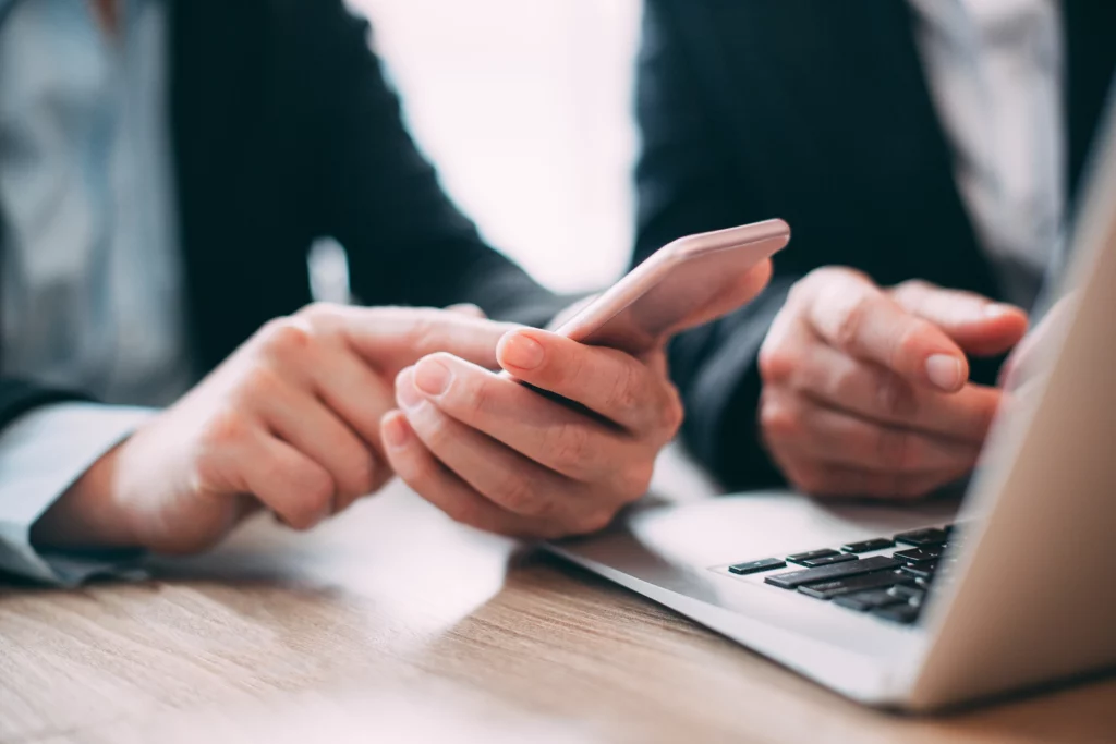 businesswoman reading message mobile phone